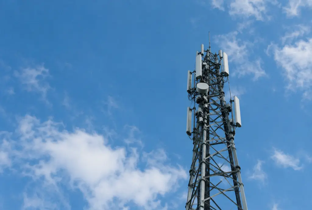 A telecommunications mast against the sky